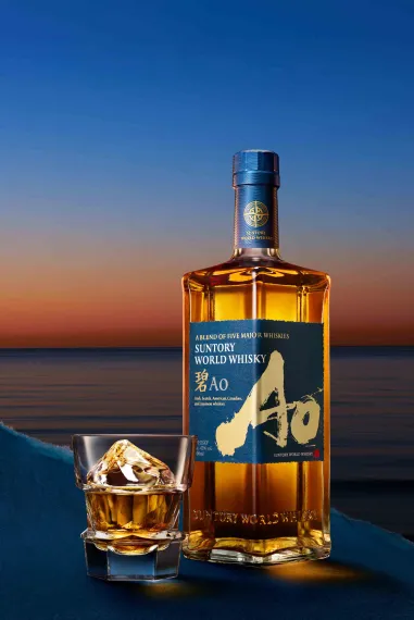 A bottle and a glass of Suntory World Whiskey Ao
