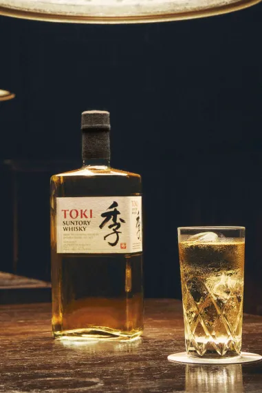A bottle and a glass of Toki whisky
