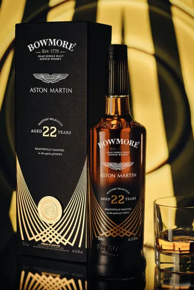 bowmore and aston martin masters reunite for the introduction of masters selection 22 year old single malt scotch whisky