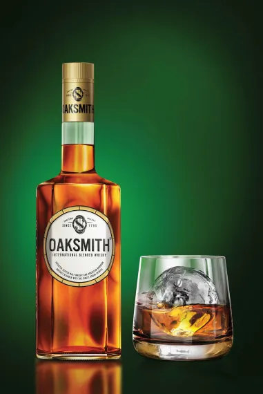 Oaksmith International Bottle with glass full of whisky