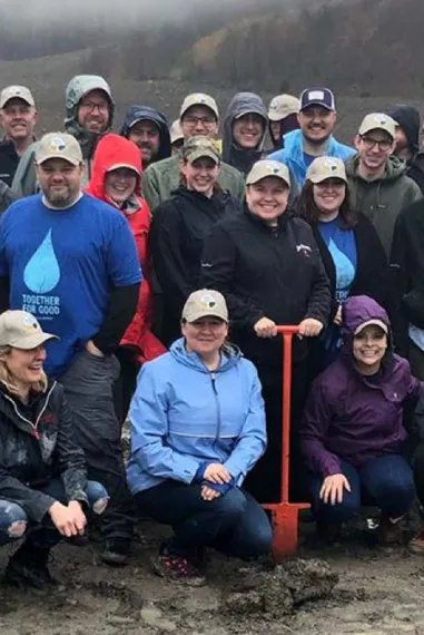 beam Suntory employees gathered together for a photo on site of a community service event