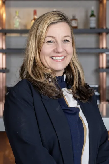 Carol Roberts, President, International