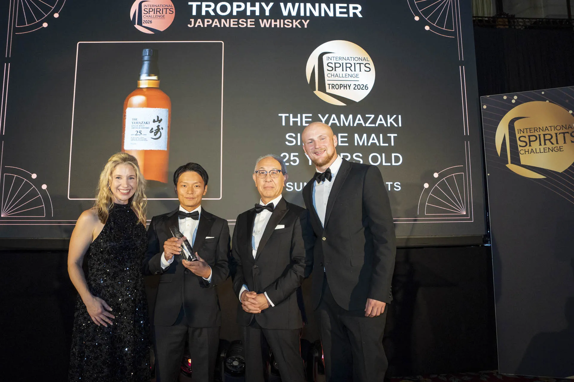 Hidemichi Takaki, Blender, Suntory Spirits Limited, holding the Trophy, alongside Shinji Fukuyo, Chief Blender, The House of Suntory