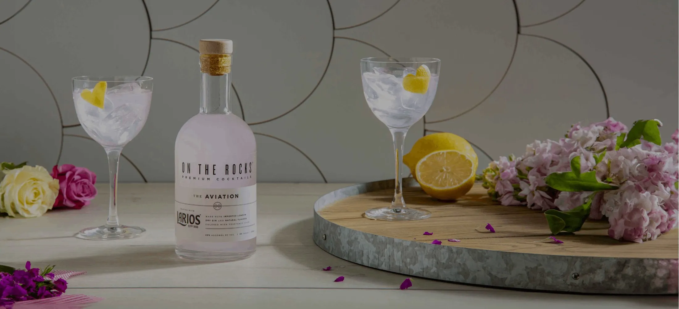 A bottle and a glass of On the Rocks pre-mixed cocktail